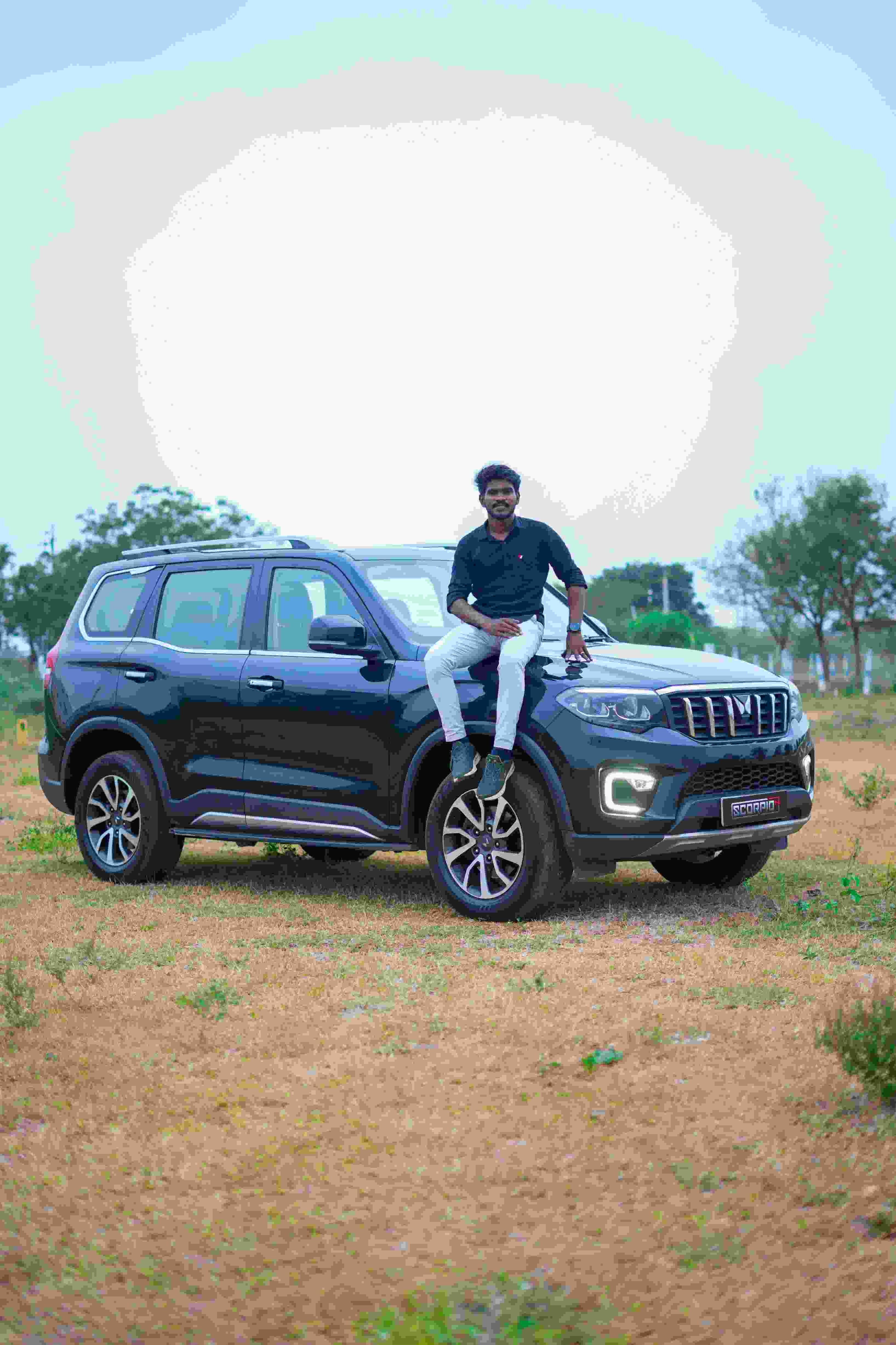 SUV parked outdoors with owner