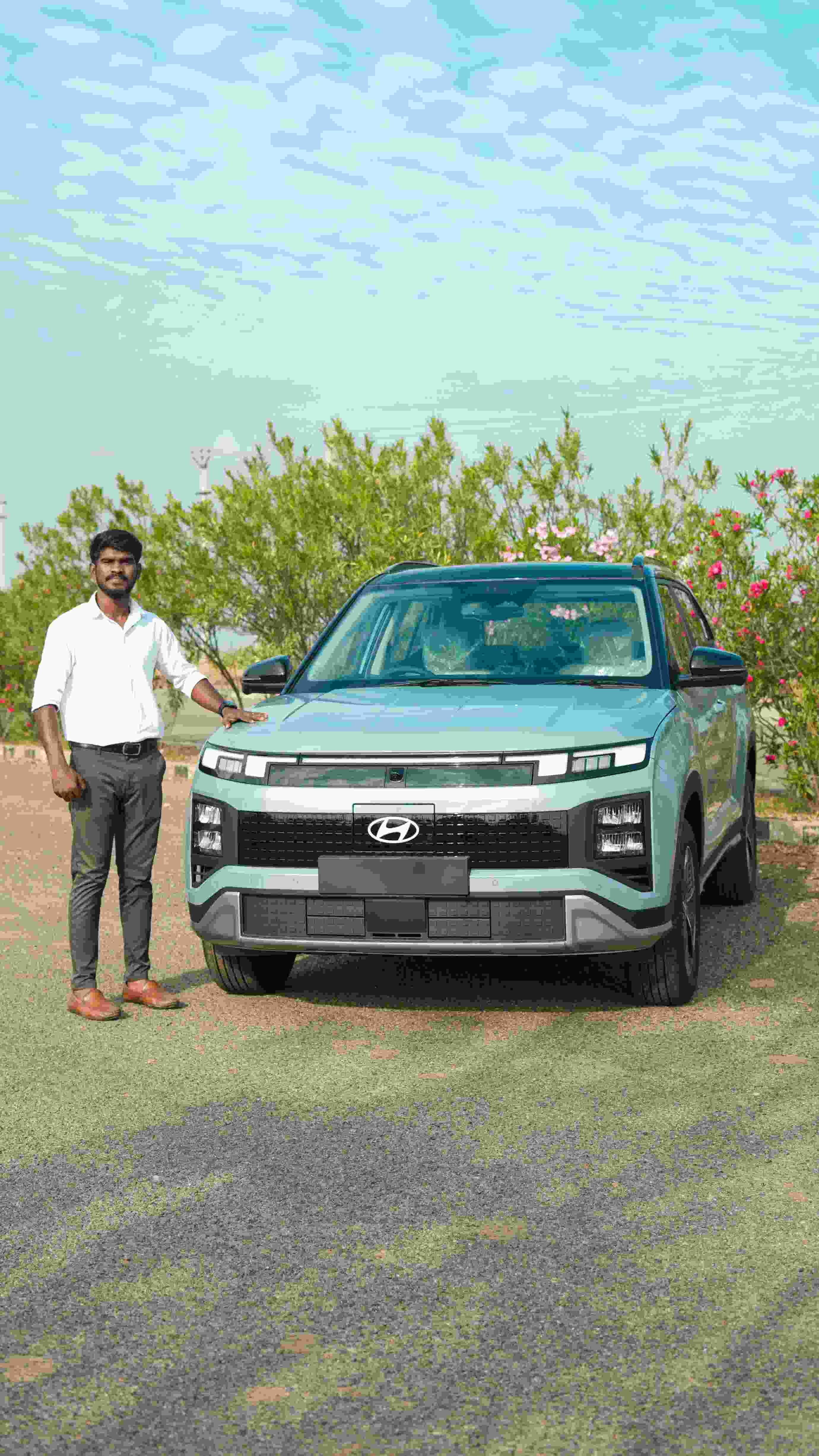 Modern SUV vehicle with owner outdoors