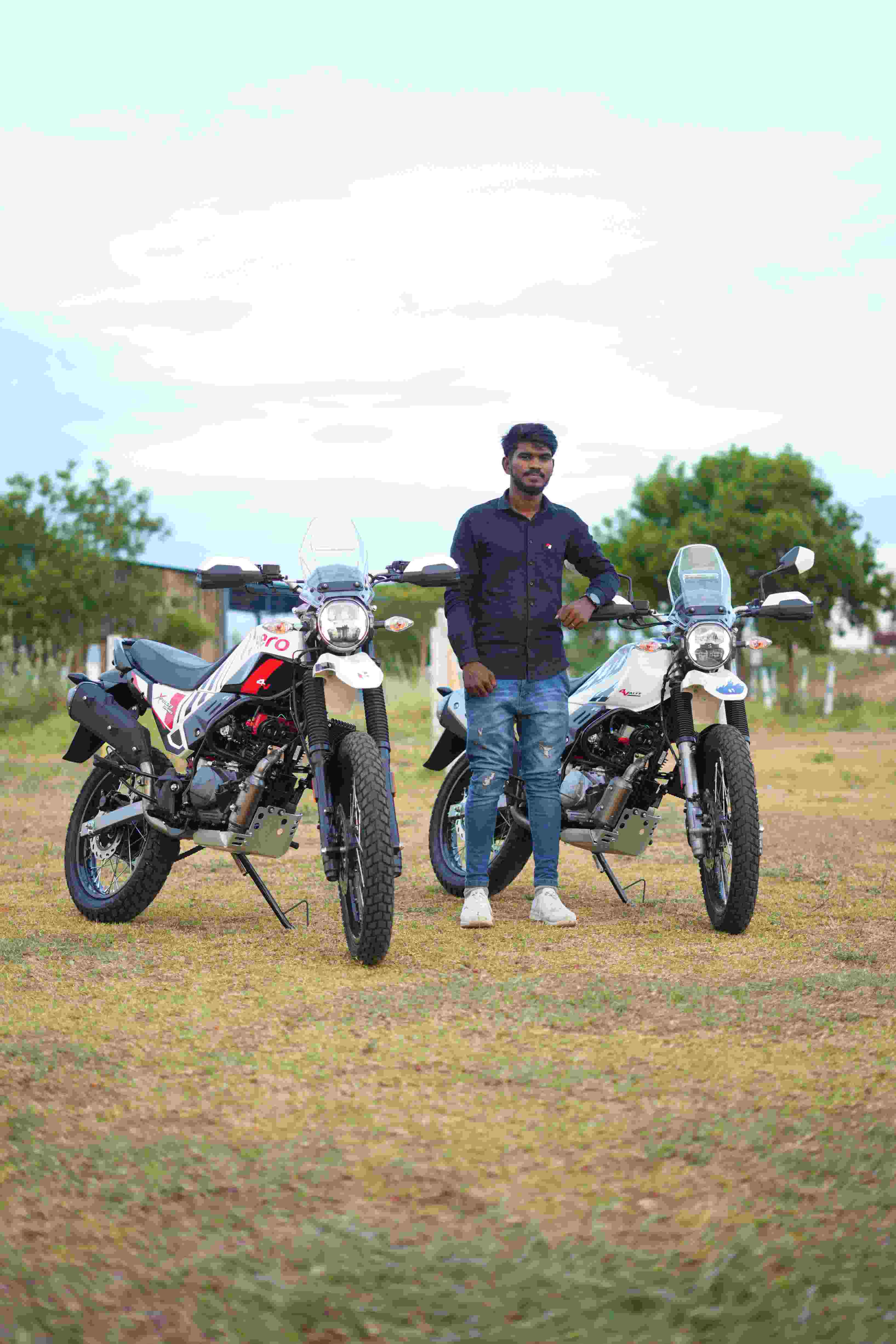 Bike collection with riders outdoors