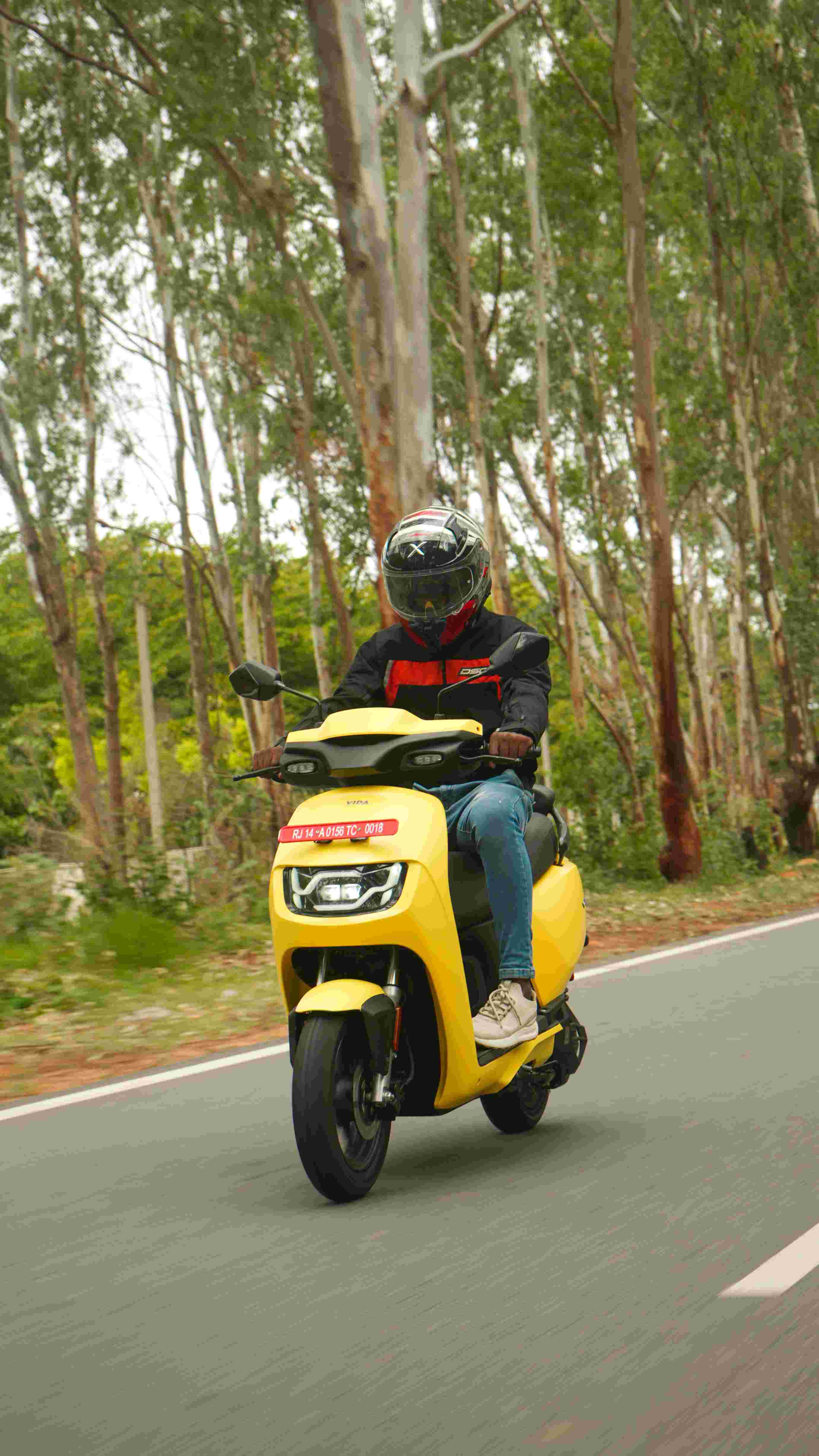 Yellow scooter road ride
